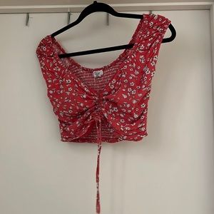 small crop top. red top with floral dainty flowers.